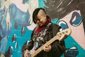 Lilah Davis playing bass