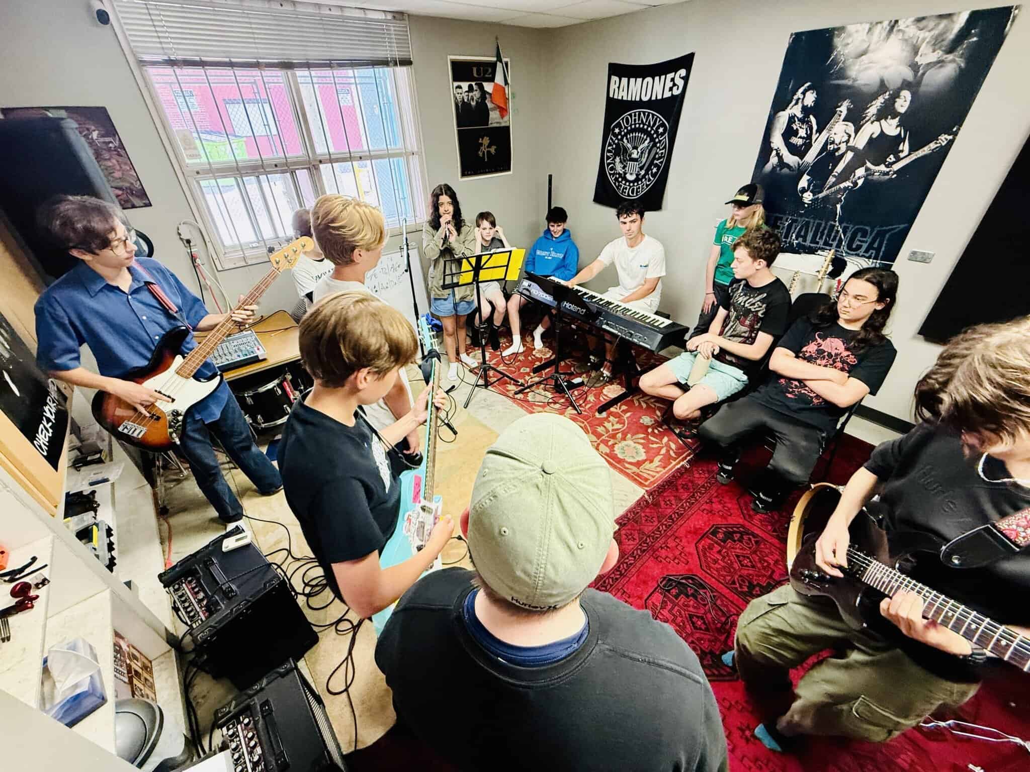 Student performing for each other at Summer Rock Camp in Edmonton