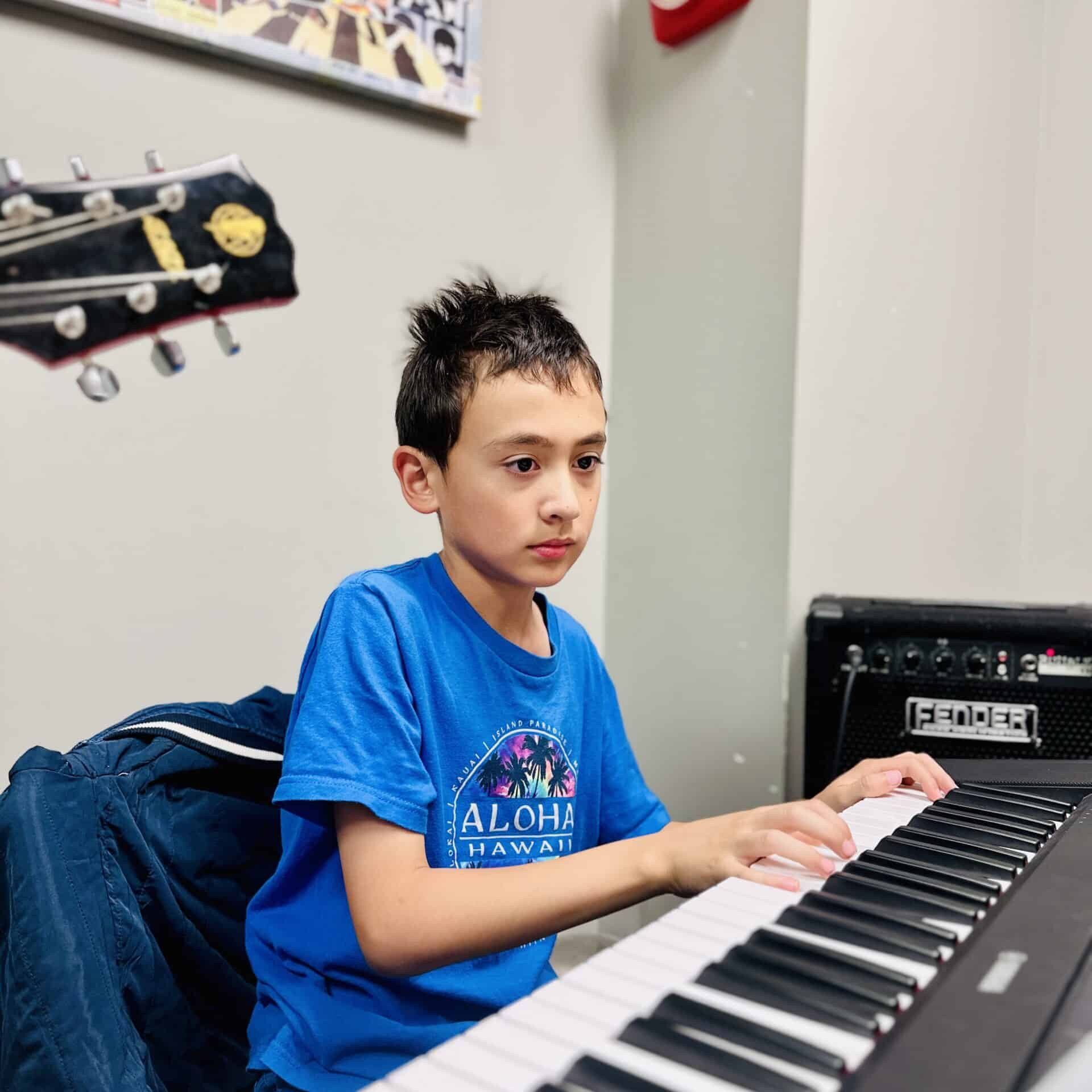 Theo Mah playing piano Theo Mah playing piano