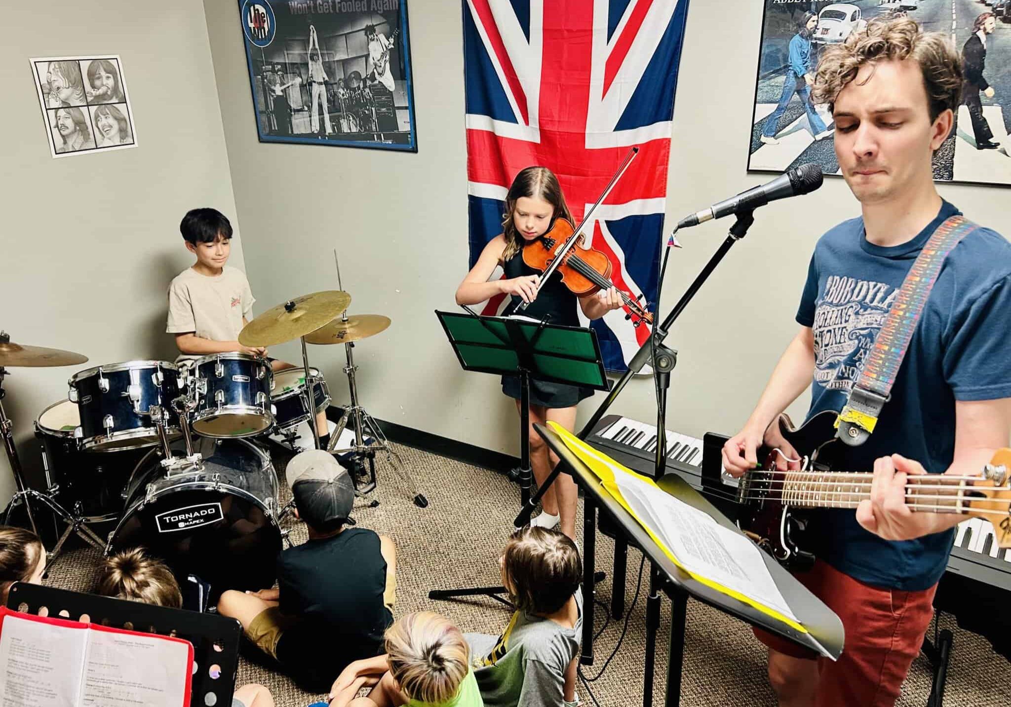 Kids' Rock Band in Edmonton Children aged eight to ten playing in a Rock Band.